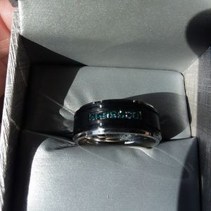 Men's custom titanium ring with 7 blue diamonds